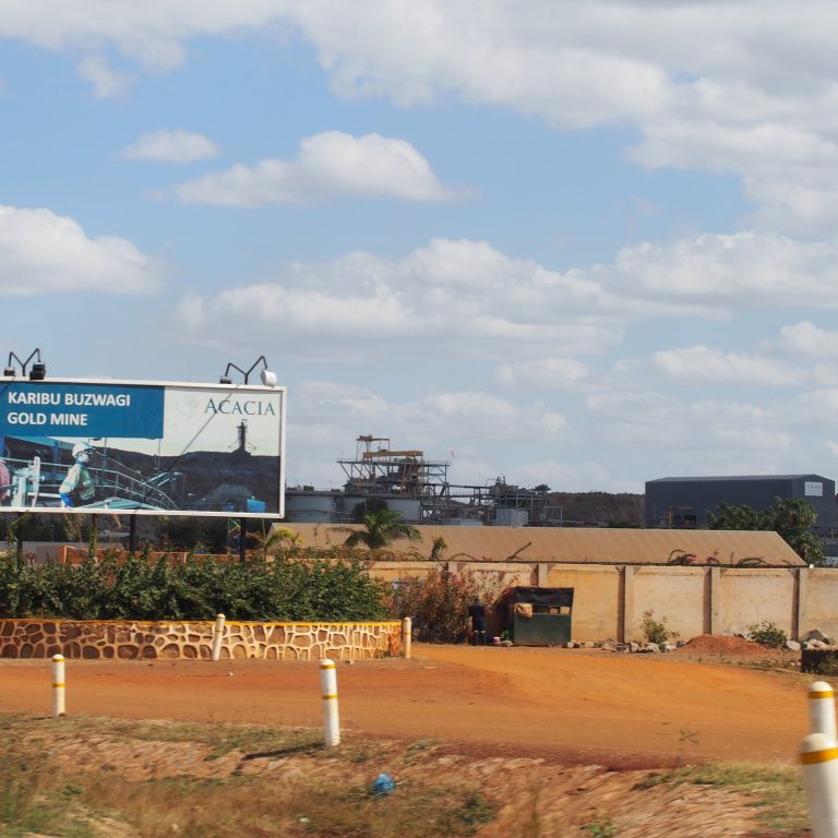 Acacia Mining company's sign and office