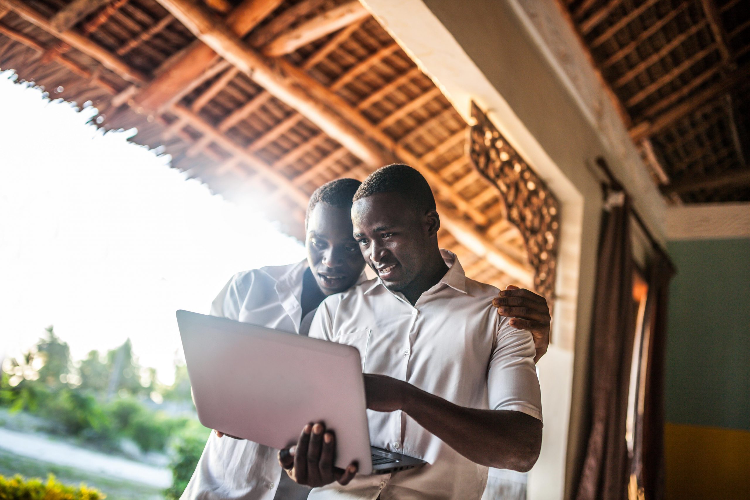 African teenagers using a laptop